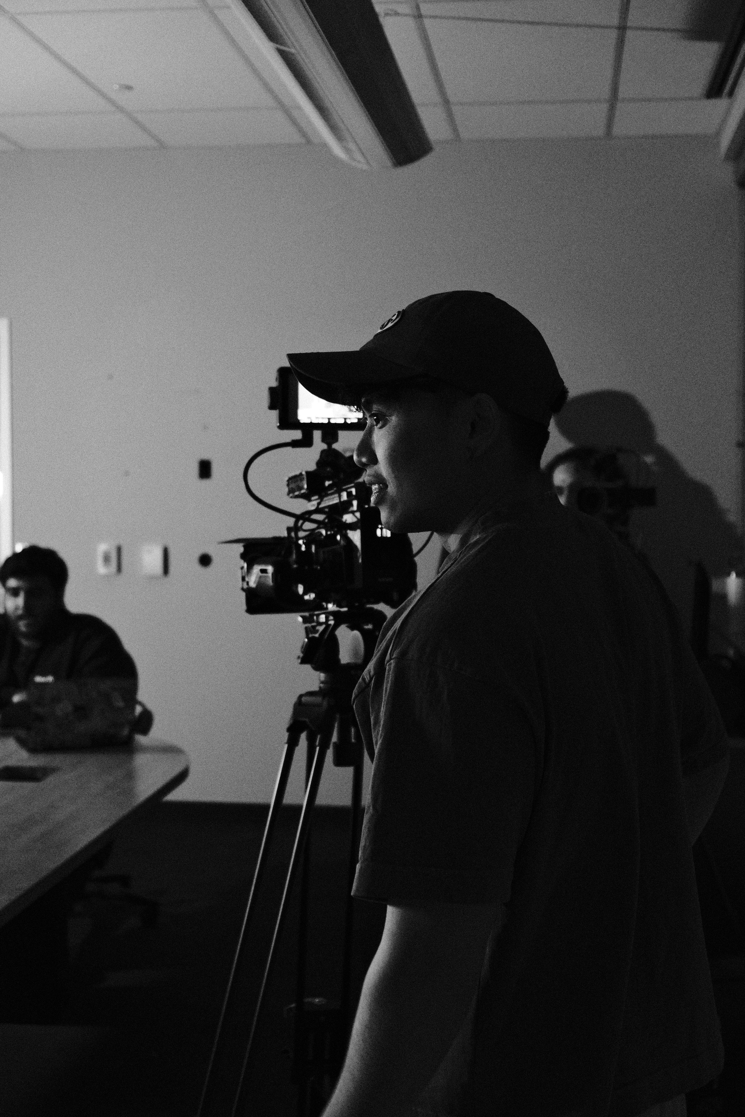 Tai and the CK team preparing a camera on location